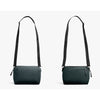 Two dark green shoulder bags with black straps on a light gray background