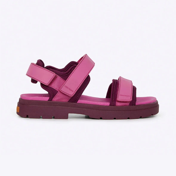 Pink and purple sandal on a light gray background