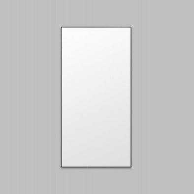 Rectangular mirror with black frame on a gray background